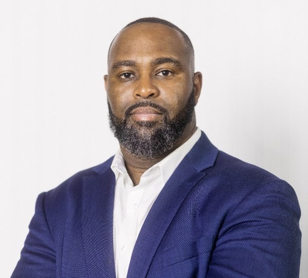 TC Bell — Founder of SynergyAI, host of the AI Client Magnet Challenge